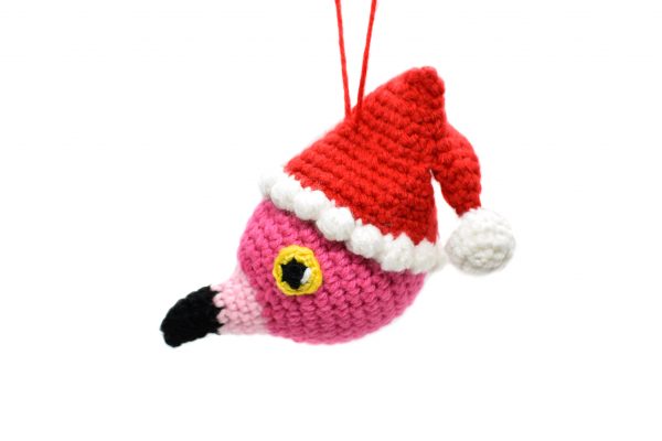 image of a hanging ornament crochet flamingo head wearing a Santa hat