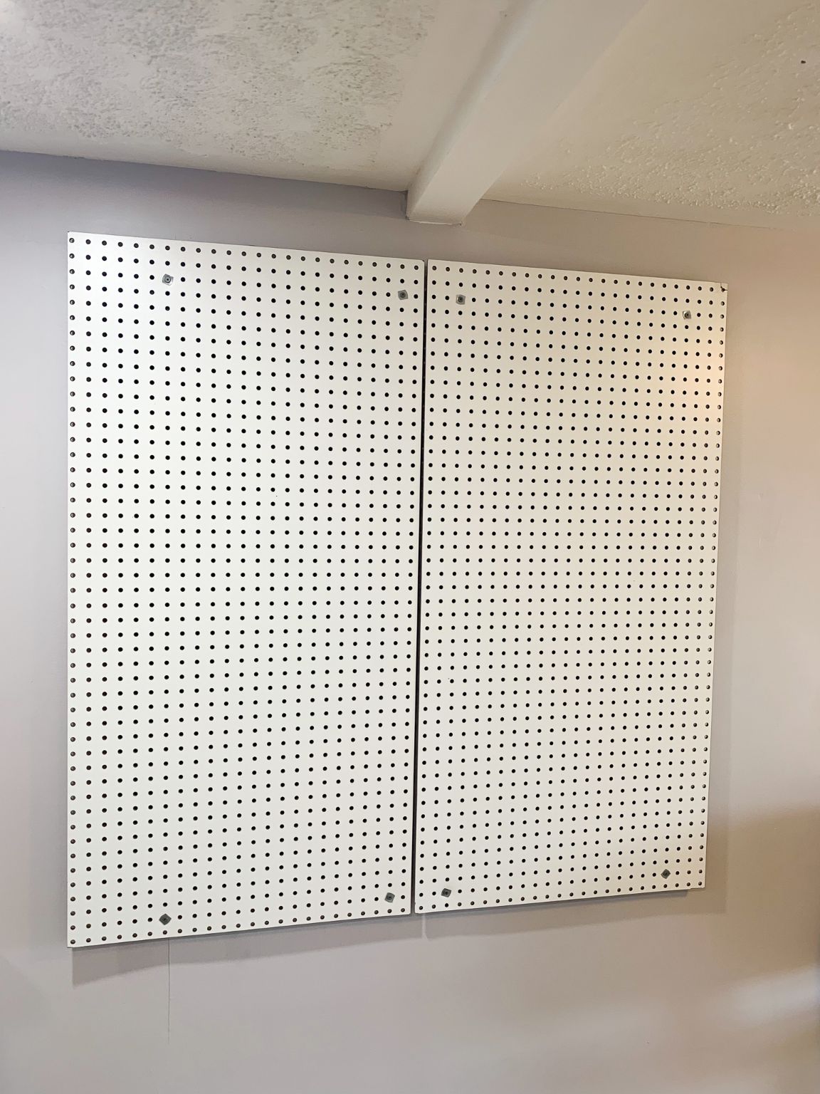 Organize Your Yarn with this Awesome Pegboard Yarn & Craft Wall